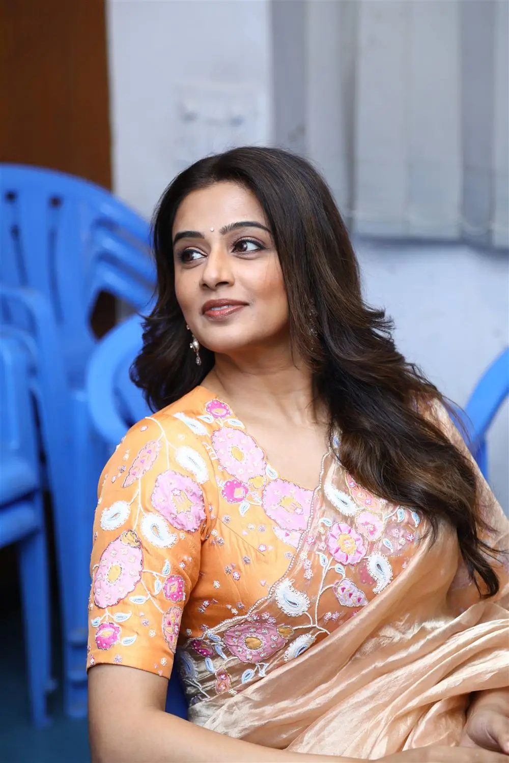 Tamil Girl Priyamani Long Hair Orange Saree